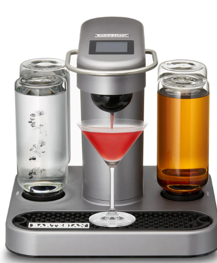 cocktail machine with cocktail glass and bottles of alcohol